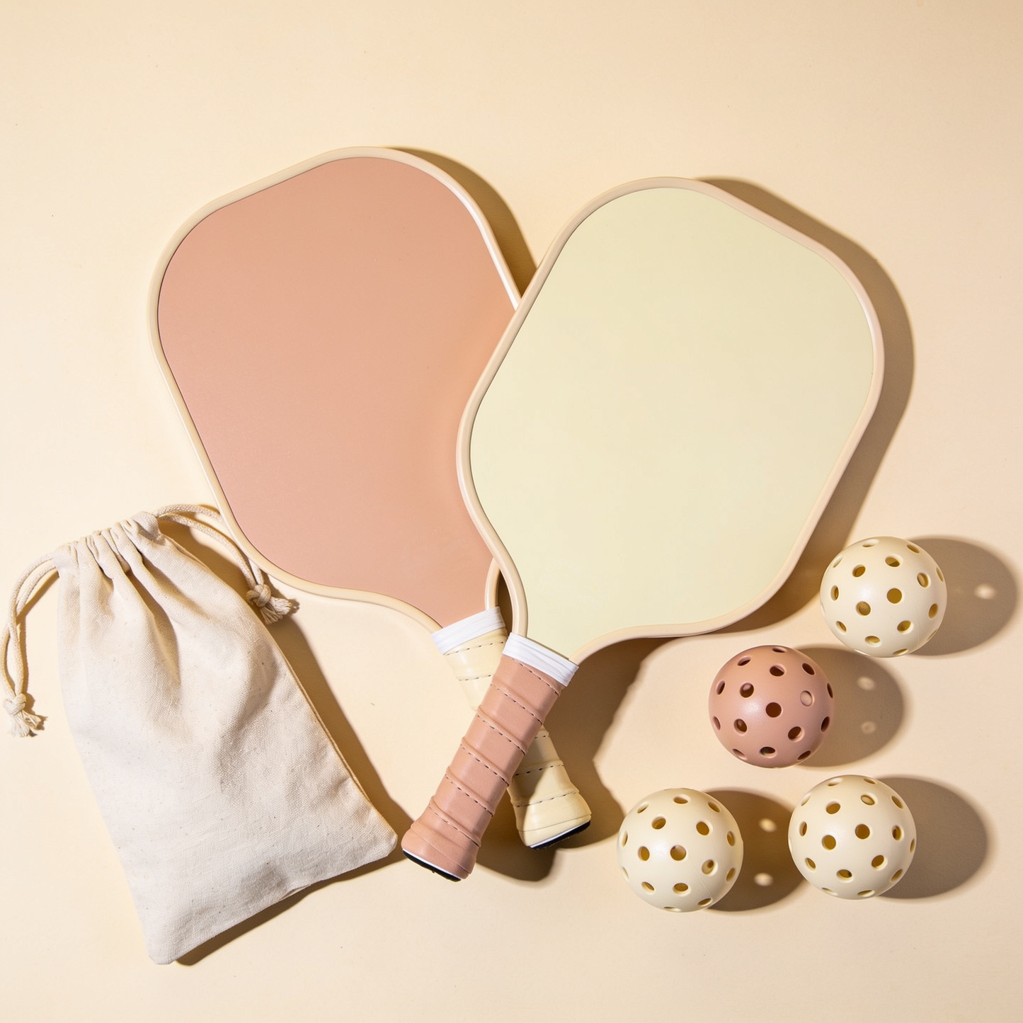 Starter Set of Two — two paddles, four balls and canvas bag flat-lay